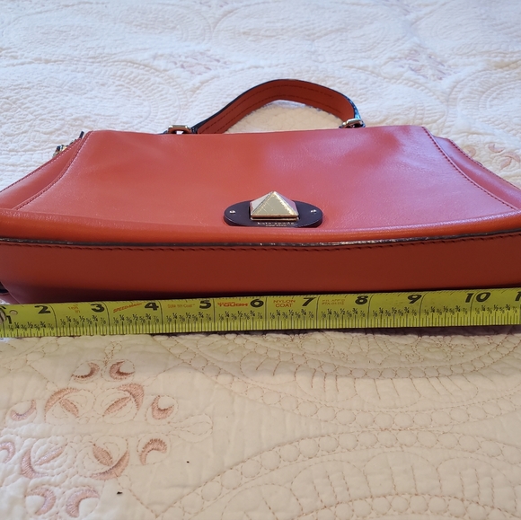 Kate Spade orange leather purse.  12" x 9" Two side zippers three inside pockets - Picture 10 of 11